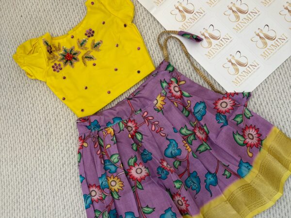 Yukthi - Yellow and purple hand embroidery floral work top and floral kalamkari skirt