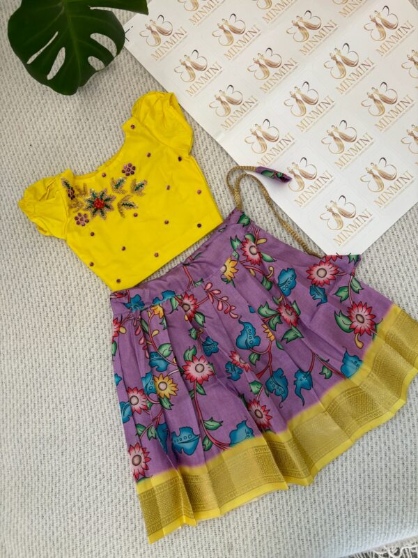 Yukthi – Yellow and purple hand embroidery floral work top and floral kalamkari skirt
